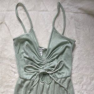 Green and white striped jumper